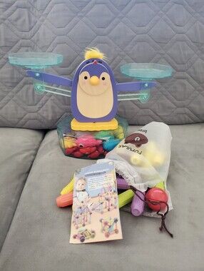 Battat penguin balance scale and magnetic building set